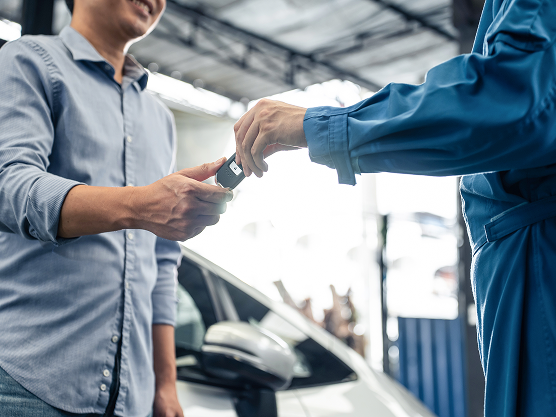 Partner handing over keys